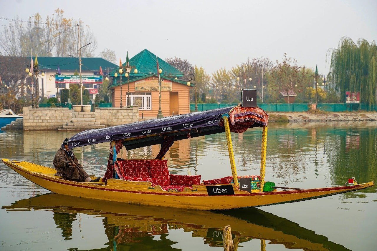 Experience the magic of Dal Lake by pre-booking Shikara rides through the Uber App during busy holiday season