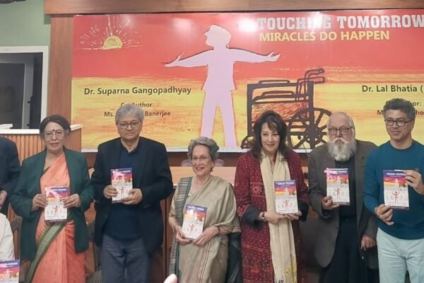 The new inspirational book titled "Touching Tomorrow - Miracles Do Happen" was officially launched at the Kolkata Press Club